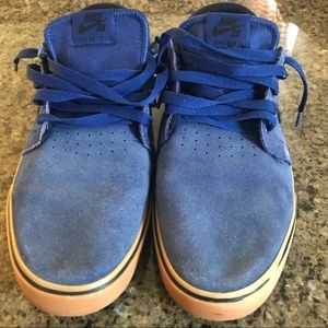 Blue NikeSB team edition shoes.